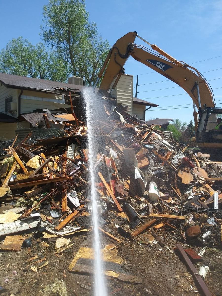 Residential demolition with dust control