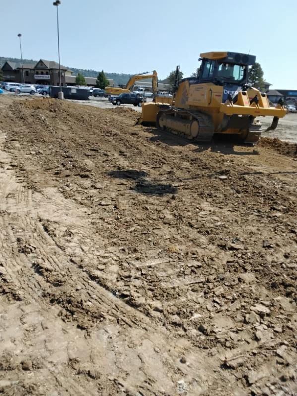John Deere dozer shaping the site to grade