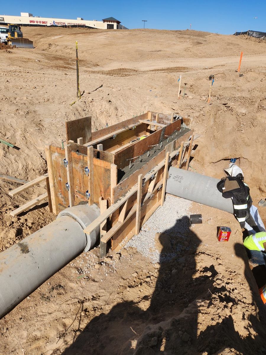 Wood formwork for a cast-in-place storm structure over RCP pipe