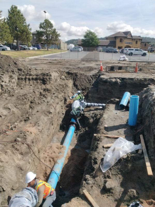 Water main tie-in at a commercial site